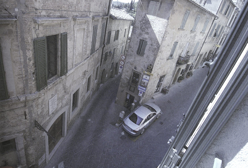 PHOTOGRAPHS FROM AN OPEN CAR