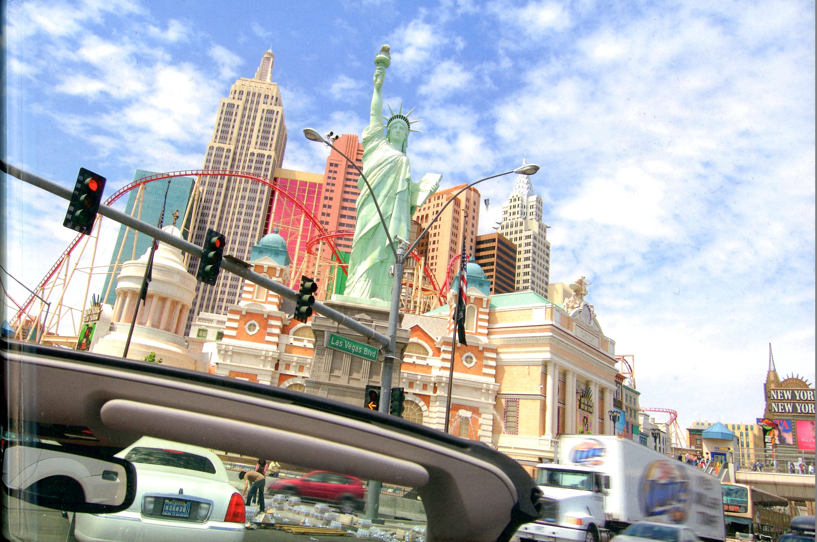 PHOTOGRAPHS FROM AN OPEN CAR