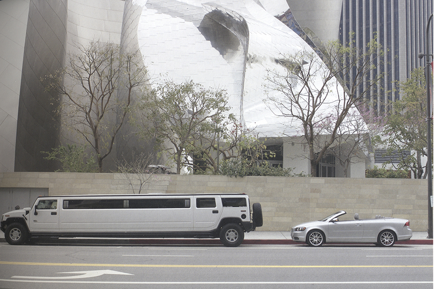 PHOTOGRAPHS FROM AN OPEN CAR